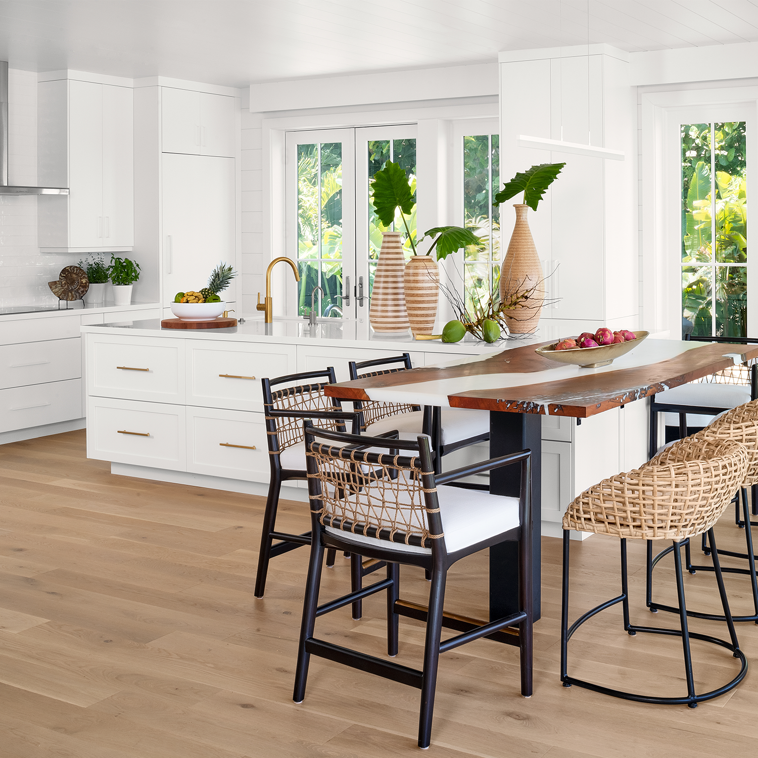 Contemporary white kitchen with live edge, resin filled peninsula