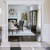 view from entry into formal dining room showing different types of flooring including plaid marble, white area rug, and dark hardwood floors | Bountiful Flooring, Easton, MD