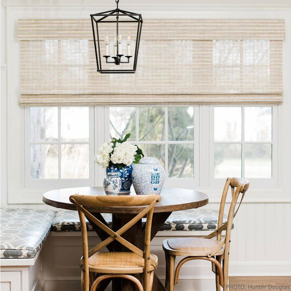 Hunter Douglas woven blinds in breakfast nook - available through Bountiful Flooring